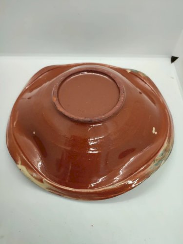 Beau plat de forme ondulé signé Ceramp en bon etat