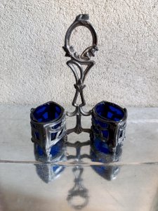 beautiful old metal and blue glass salt and pepper shaker in good condition