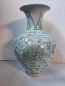 beautiful celadon Chinese vase with floral decoration signed in good condition