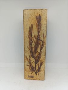 Beautiful decorative vase with branches, signed Raymonde Leduc, in good condition.