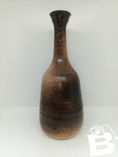 beau vase signé Jean Marais en bon etat