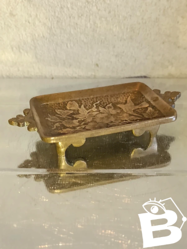 beau vide poche debut 20eme en bronze à decor doiseaux en bon etat