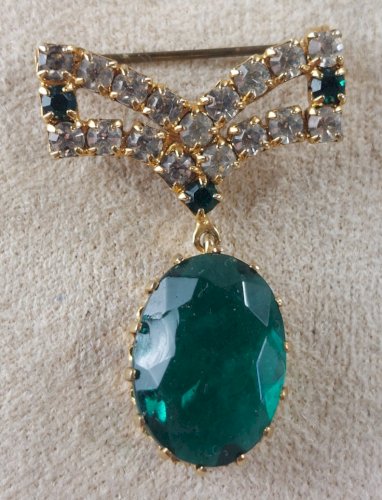 Belle ancienne broche, en métal doré, décor strass