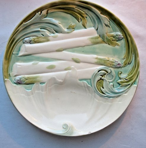 Belle assiette à asperges en barbotine signée LUNEVILLE KG Keller-Guérin,