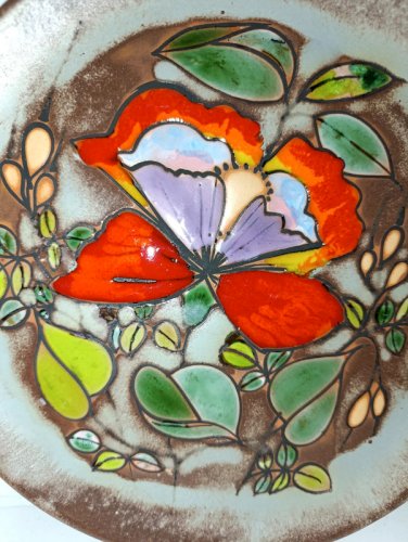 belle assiette emaillé à decor floral en bon etat