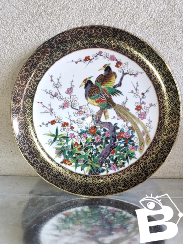 belle assiette en porcelaine asiatique decor floral et doiseaux en bon etat