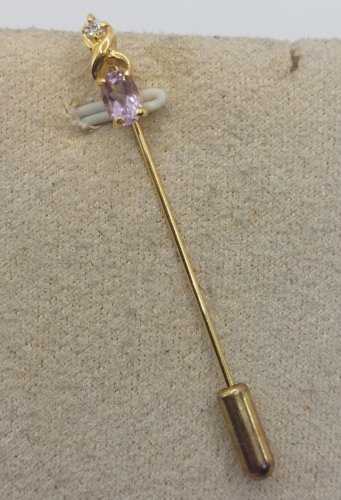 Belle broche / épingle, en métal doré et strass
