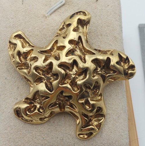 Belle broche forme étoile de mer, en métal doré, Gil dAgena, vintage ^