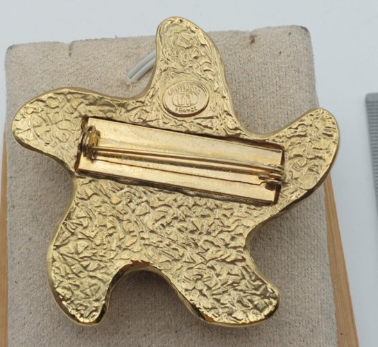 Belle broche forme étoile de mer, en métal doré, Gil dAgena, vintage ^