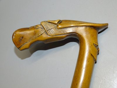 - BEAUTIFUL CANE WITH HORSE HEAD HANDLE AND MAN'S FACE DECORATION COLLECTION D