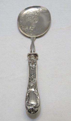 -BELLE CUILLERE A GLACE AVEC MANCHE ROCAILLE ARGENT FOURRE Poinçon Minerve    D