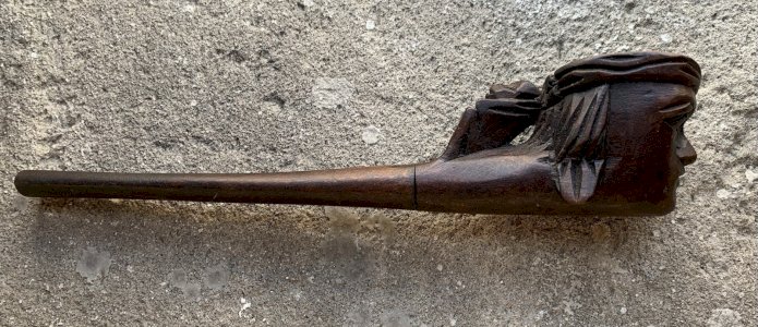 Beautiful antique carved wooden pipe featuring a Hindu head and monkey.