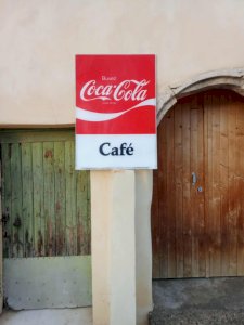 Beautiful advertising sign of an old Coca-Cola lighted sign.