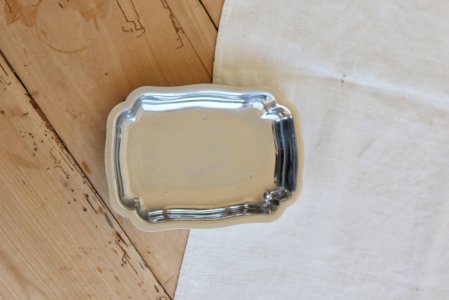 Vintage rectangular butter dish with scalloped edges in shiny metal