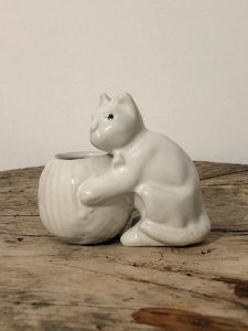 White porcelain cat figurine