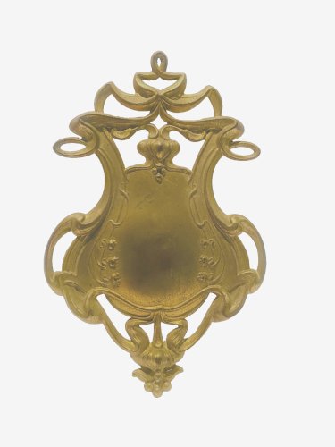 Blason Art nouveau en laiton repoussé XX siècle