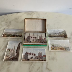 Box of lithographed cubes puzzles depicting 19th century Prague in 6 views M3763