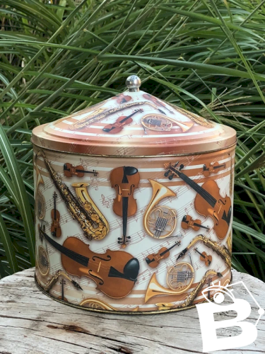 Boîte en métal motifs instruments de musique