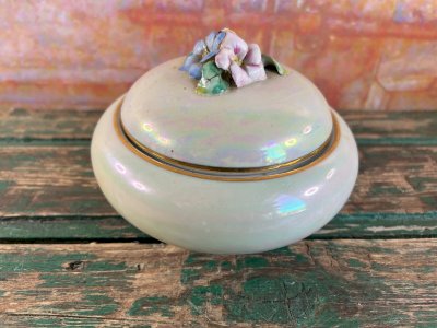 Iridescent porcelain box with relief floral decoration – Signed J.P. – Circa 1900