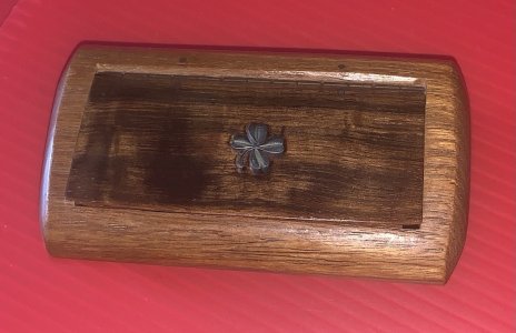 walnut snuffbox with a silver clover inlay