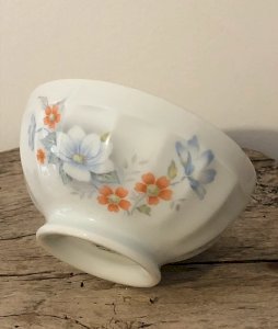 Vintage retro porcelain bowl from Limoges with floral patterns