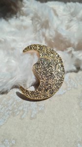 Yves Saint Laurent earring, one only.