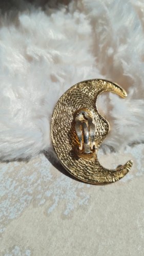 Boucle d oreille Yves Saint Laurent  une seule