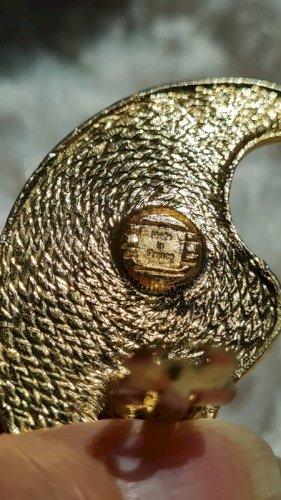 Boucle d oreille Yves Saint Laurent  une seule