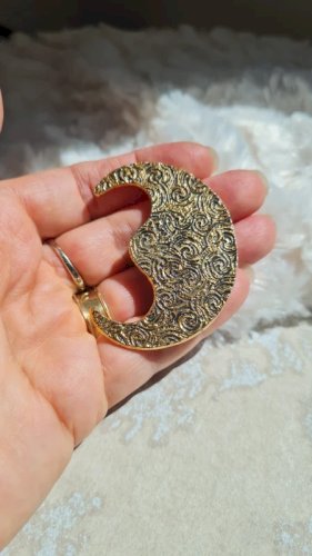 Boucle d oreille Yves Saint Laurent  une seule