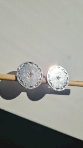 Silver metal clip-on earrings signed FY