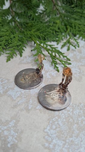 Boucles d oreilles - clips - en métal argenté signée FY