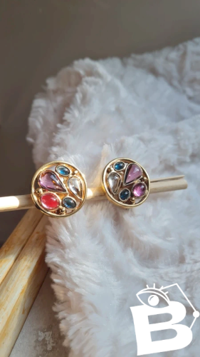 Boucles doreilles - clips haute couture signés