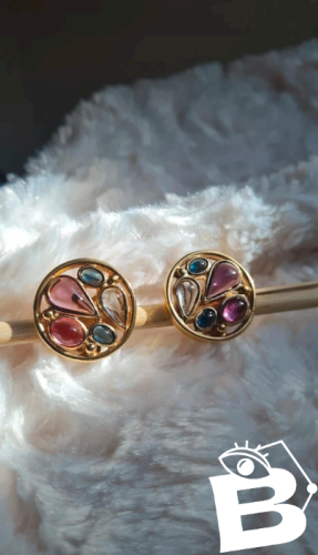 Boucles doreilles - clips haute couture signés