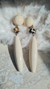 Boucles doreilles - clips signées Alexandrine