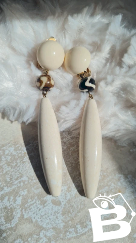 Boucles doreilles - clips signées Alexandrine