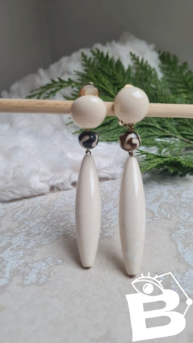 Boucles doreilles - clips signées Alexandrine