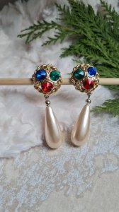 Vintage clip earrings with green, blue, and red rhinestones.