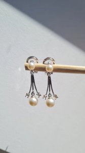Silver earrings with rhinestones and faux pearls