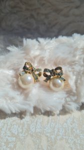 Boucles doreilles Nina Ricci - clips vintage