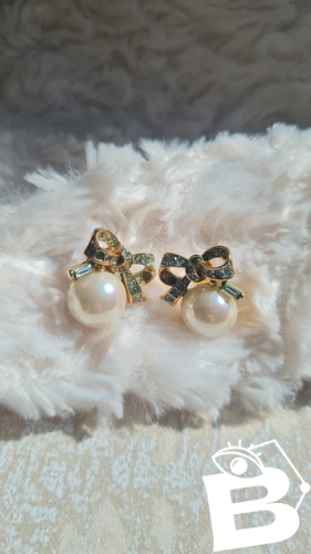 Boucles doreilles Nina Ricci - clips vintage