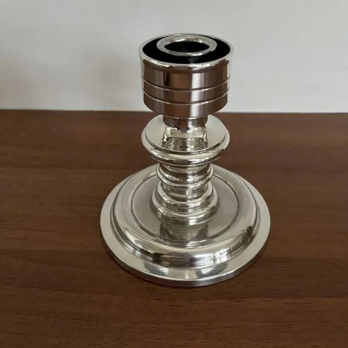 Bougeoir design en métal argenté