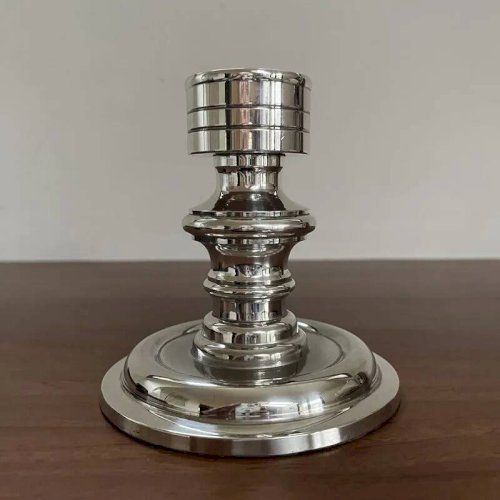 Bougeoir design en métal argenté