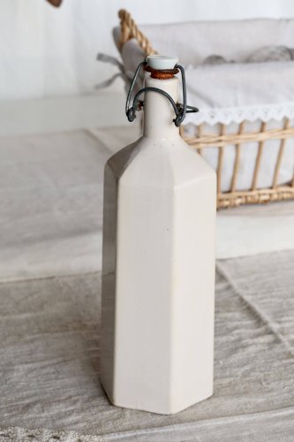 Bouteille ancienne en céramique émaillée beige