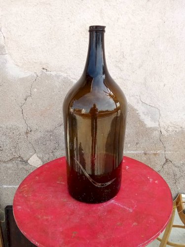 Bouteille ancienne en verre soufflée