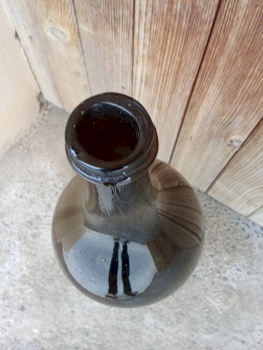 Bouteille ancienne en verre soufflée 