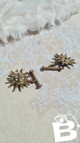 Boutons de manchette soleil
