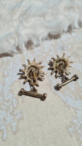 Boutons de manchette soleil