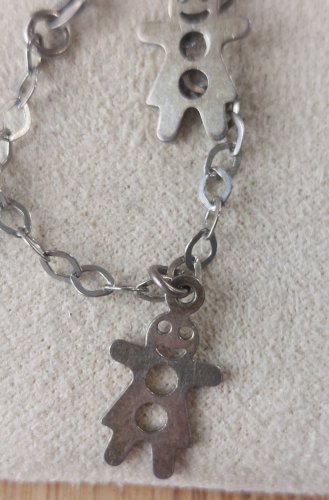 Bracelet décor bonhomme pain d'épice, en argent massif