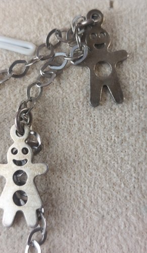 Bracelet décor bonhomme pain d'épice, en argent massif