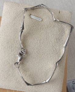 Wave design bracelet, made of solid silver.